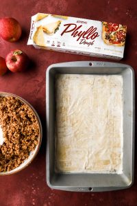 First layer of phyllo in pan for Apple Pie Baklava